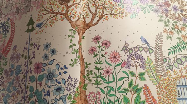 Colored picture of a tree and flowers