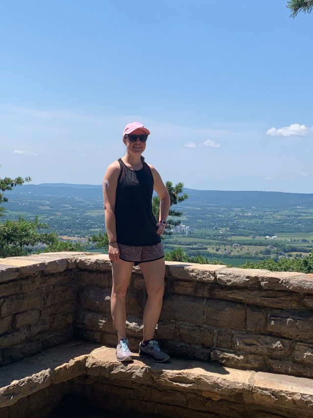 Woman with Type 1 diabetes at a mountain overlook